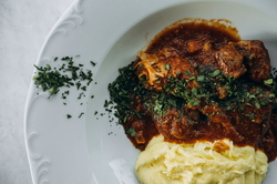 SPEZZATINO, SLOW-COOKED VEAL WITH ARTICHOKES