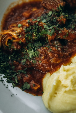 SPEZZATINO, SLOW-COOKED VEAL WITH ARTICHOKES