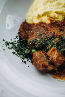 SPEZZATINO, SLOW-COOKED VEAL WITH ARTICHOKES
