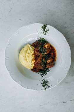 SPEZZATINO, SLOW-COOKED VEAL WITH ARTICHOKES