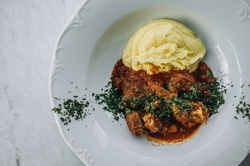 SPEZZATINO, SLOW-COOKED VEAL WITH ARTICHOKES